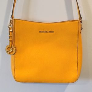 Orange yellow Michael Kors crossbody purse bag
